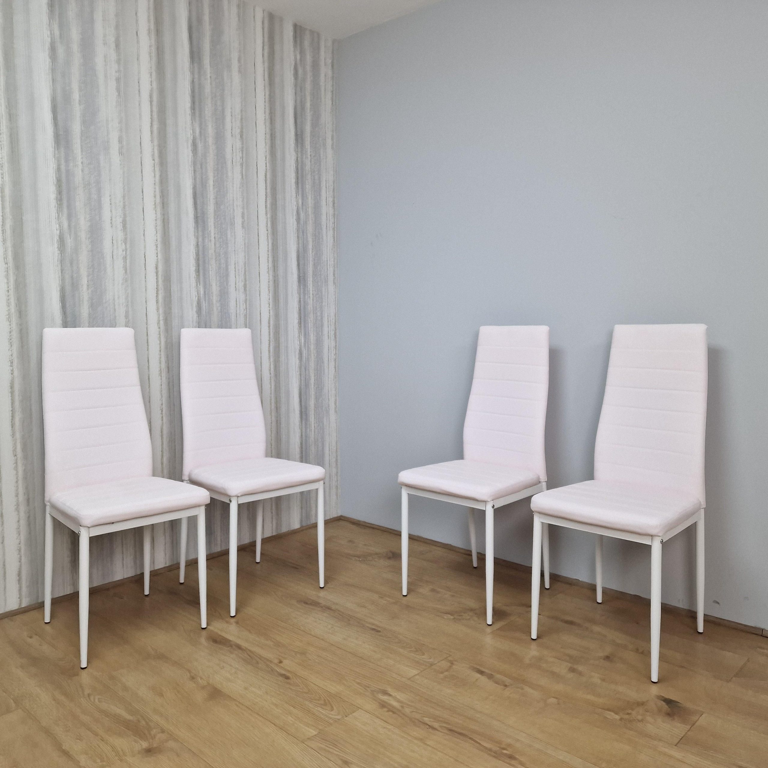Four White Faux Leather Padded Chairs With Tint Of Pink