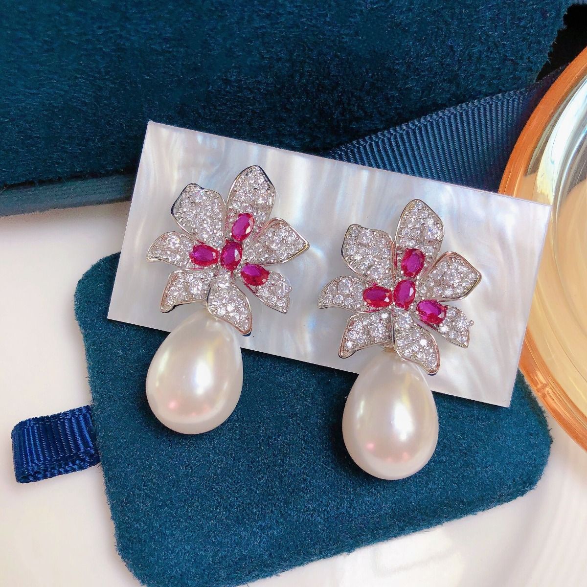 Pearl Drop Earrings with Sparkling Accents in Silver